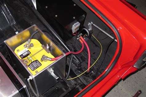 Wires to battery in the trunk 